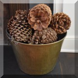 D20. Brass bucket with pinecones 10”h 